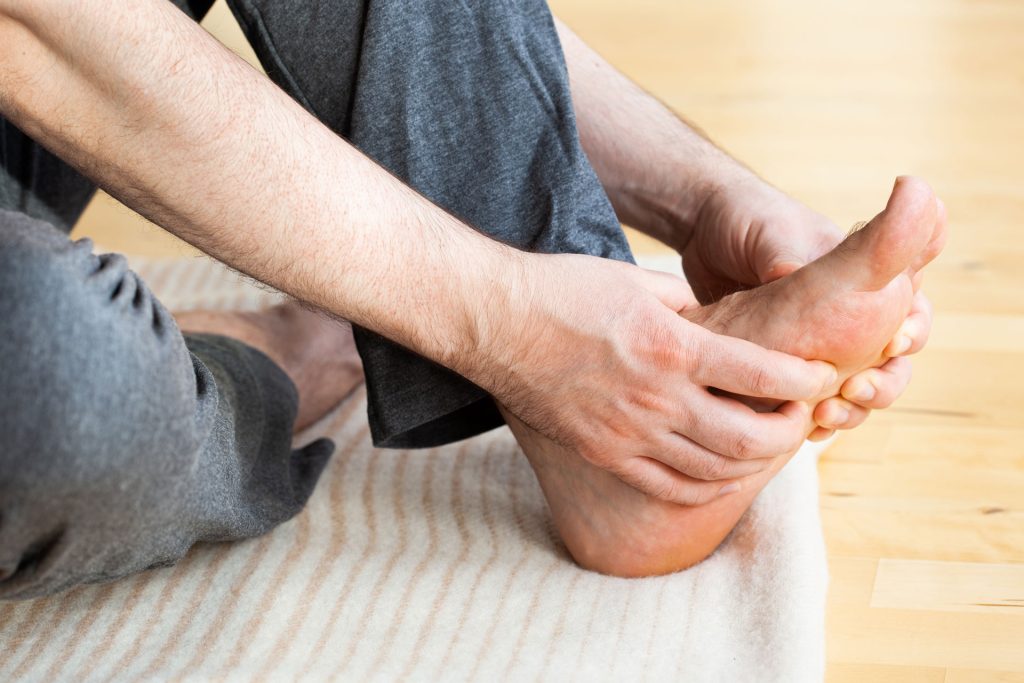 Man doing stretching exercise.