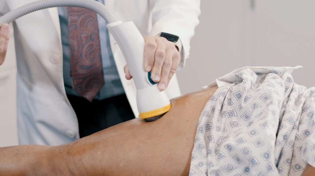 Softwave therapy on back.